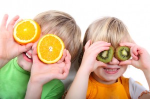 children playing with fruit